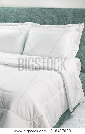 Modern Bedroom With Pillows On Bed, Interior Design Concept Decoration