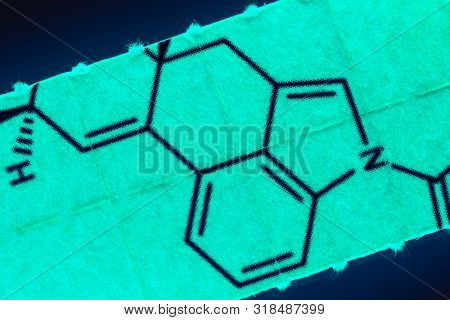 pieces of paper with chemical structures, micro dosing concept