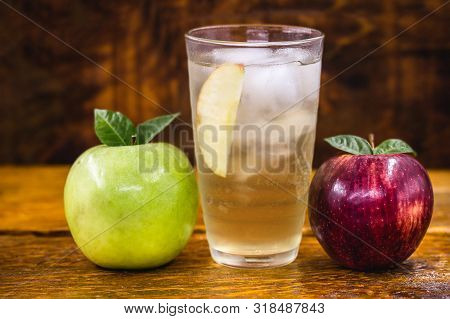 Apple Spritzer (apfelschorle) Pitcher, Glass Pitcher Of Homemade Spritzer Served With Crushed Ice An