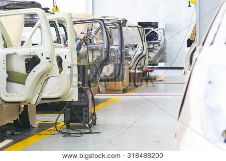 Auto Repair Service. Automobile Special Workers Auto Service Station Garage