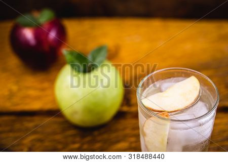 Apple Spritzer (apfelschorle) Pitcher, Glass Pitcher Of Homemade Spritzer Served With Crushed Ice An