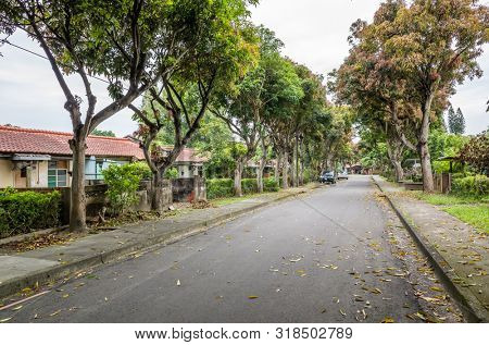 Nantou, Taiwan - June 25th, 2019: street scenery with old house and trees at Zhongxing New Village, Nantou, Taiwan