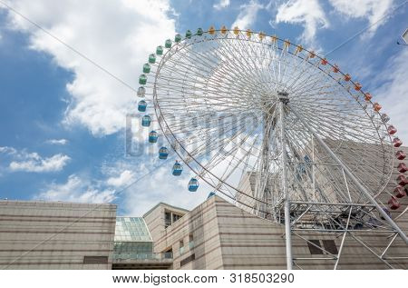 Taipei, Taiwan - Jun 8th, 2019: Ferris wheel and Miramar entertainment shopping mall in Dazhi, Taipei, Taiwan, Asia