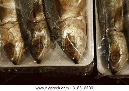 Cooked Fish On A Foam Plate To Be Sold In A Market In Southeast Asia