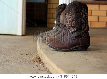 Womens Leather Cowboy Boots Removed Outside After Used On The Farm In Tamworth, New South Wales, Rur
