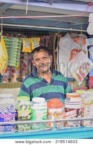 Kolkata, India-july 27,2019: Shopkeeper Selling Goods At Patuli Floating Market, Kolkata, India
