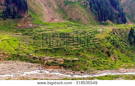 Agricultural Landscape And Houses In Mountains In The Naran Valley