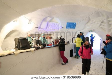 Mayrhofen, Austria - March 13, 2019: People Visit Ahorn White Lounge, A Bar Made Of Ice In Mayrhofen