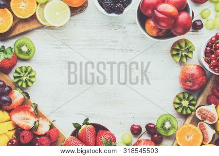 Healthy Raw Breakfast Background, Cut Fruits, Strawberries Raspberries Oranges Plums Apples Kiwis Gr