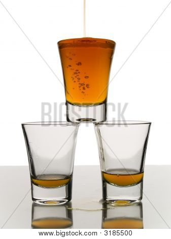 Três doses de Whisky