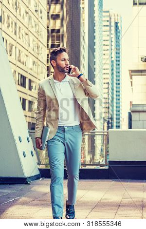 European Businessman Working In New York City, With Beard, Little Gray Hair, Wearing Beige Blazer, L