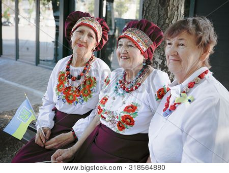 Ukraine, Pokrov - August 23, 2019: National Flag Day Celebration. Three Elderly Females Friends Dres