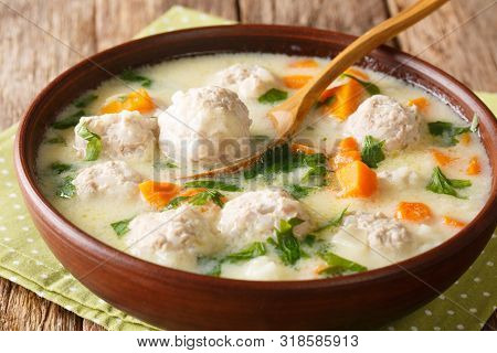 Bulgarian Chorba Topcheta Soup With Meatballs, Yogurt And Vegetables Close-up In A Bowl. Horizontal