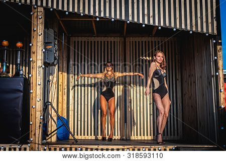 Moscow, Russia - July 27, 2019: Go Go Dance Outdoor. Two Sexy Woman At Johncalliano Hookah Fest.