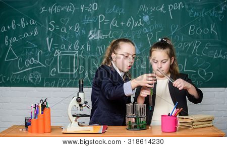 Make Studying Chemistry Interesting. Educational Experiment Concept. Microscope And Test Tubes On Ta