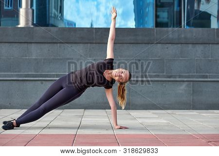 Stretching Fit Or Dancer Or Fitness Woman Doing Exercise