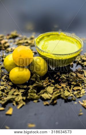 Neem Or Indian Lilac Face Mask On The Black Wooden Surface For Oily Skin Consisting Of Neem Leaves P