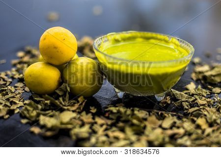 Neem Or Indian Lilac Face Mask On The Black Wooden Surface For Oily Skin Consisting Of Neem Leaves P