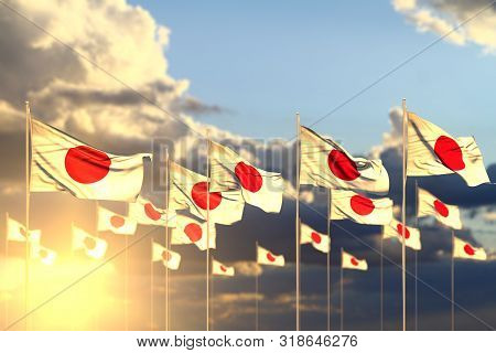 Wonderful Holiday Flag 3d Illustration
 - Many Japan Flags On Sunset Placed In Row With Selective Fo