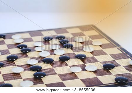 Board Game Go And Black And White Bones. Go Or Wei-chi ,asian Board Game.
