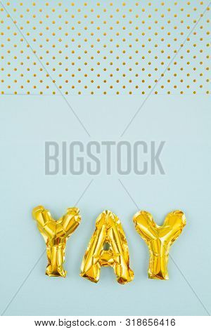 Inflated Letters Yay Ove The Pastel Background With Golden Polka Dots. Party, Celebration, Holidays 