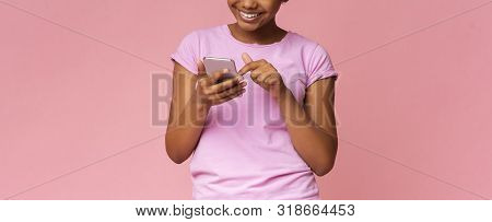 Excited African American Teen Browsing Media On Smartphone, Pink Stusio Background, Panorama With Co