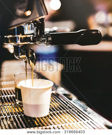 Espresso Machine Brewing A Coffee. Coffee Pouring Into Glasses In Coffee Shop, Espresso Pouring From
