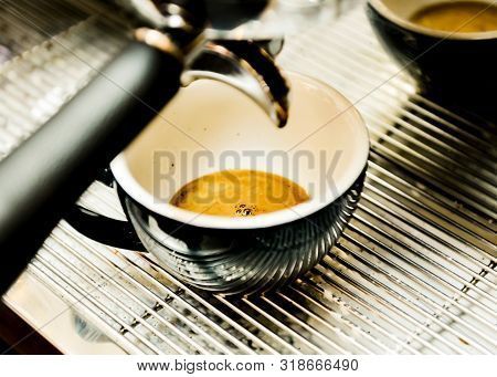 Espresso Machine Brewing A Coffee. Coffee Pouring Into Glasses In Coffee Shop, Espresso Pouring From