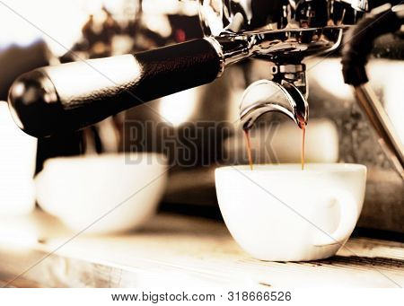 Espresso Machine Brewing A Coffee. Coffee Pouring Into Glasses In Coffee Shop, Espresso Pouring From