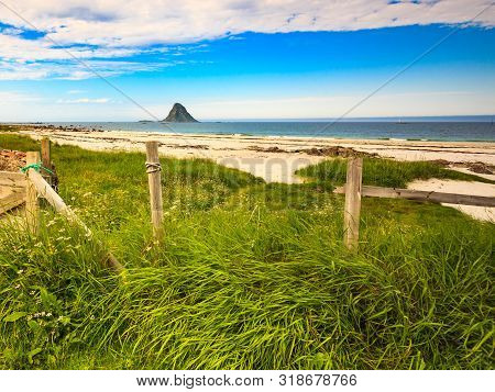 Seascape, Sea Coast With Sandy Beach And Island Bleiksoya In The Distance, Resort Bleik Andoya Norwa