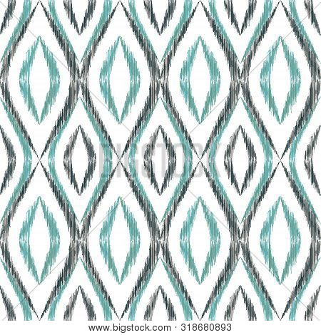 Ikat Ogee Seamless Vector Pattern Illustration. Ethnic Fabric Print Geometric Ikat Pattern. Ogee Sea