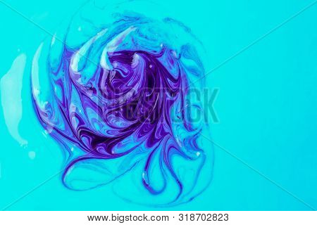 Purple Streaks On A Blue Soft Yogurt Background