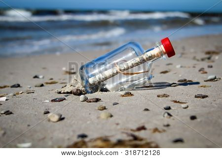 A Bottle Post On The Beach Stranded