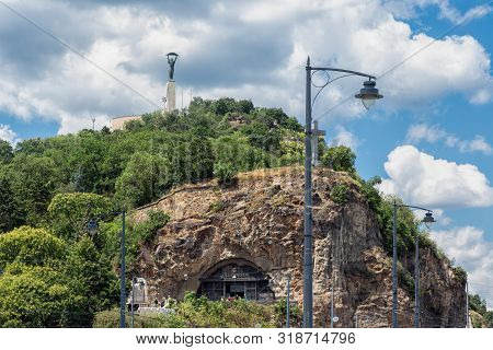 Budapest, Hungary - July 10, 2019: View At Gellert Hill With Liberty Statue On Top In Budapest