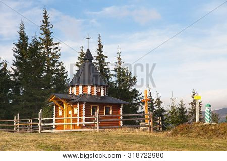 Small Wooden Church Or Chapel In Ukraine Carpathian Mountains