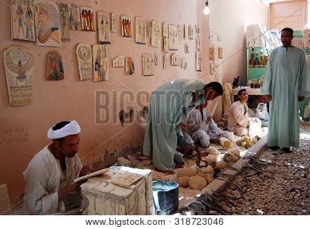 Luxor / Thebes, Egypt - May 11, 2008 - Alabaster Workers In A Workshop Working On Alabaster Items