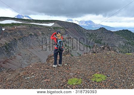 Female Hiker Enjoying The View From The Tam Mcarthur Rim Trail In The Three Sisters Wilderness Near 