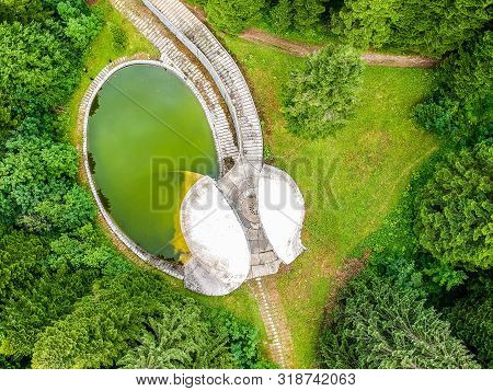 Bojiste, Bosnia And Herzegovina - July 15, 2019. Concrete Monument Spomenik Na Korcanici In Grmec Mo
