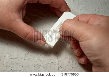 Close Up Of Woman Hands, Preparation For Express Hiv Self Test