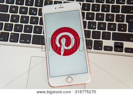 Palo Alto / Usa - August 08 2019: White Iphone With Logo Of Social Media Pinterest On The Screen. So