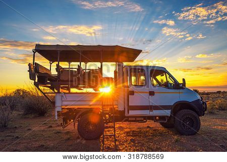 Mariental, Namibia - March 25, 2019 : African 4x4 Safari Vehicle Having A Break In The Kalahari Dese