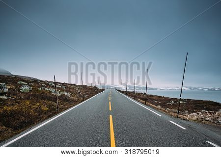 Hardangervidda Scenic Route Road In Norwegian Countryside Landscape. Asphalt Country Open Road. Free