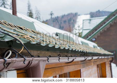 Roof Anti-icing System, For Draining Melt Water. Heated Drainpipe With An Electric Cable From Freezi