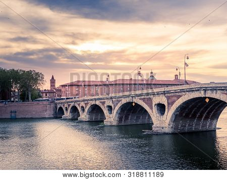 Sunset On A Bridge Of Toulouse Over The Garonne River, France