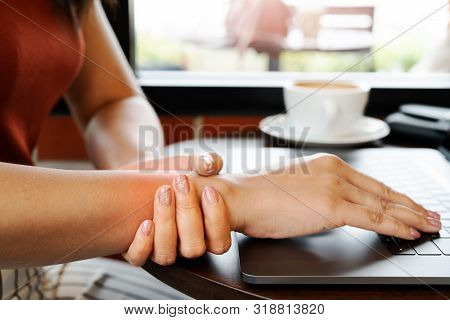Woman Wrist Hand Arm Pain Long Use Laptop Working. Office Syndrome Healthcare And Medicine Concept
