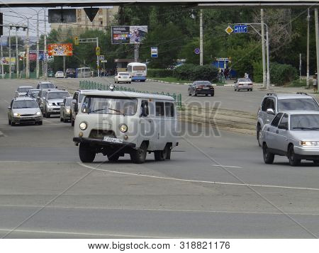 Kazakhstan, Ust-kamenogorsk, August 9, 2019: Car With Broken Wheel (tire). Uaz 452. Traffic. One Of 