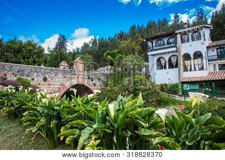 Mongui, Colombia - August, 2019: Tourists Visiting The Royal Bridge Of Calicanto At The Beautiful Sm