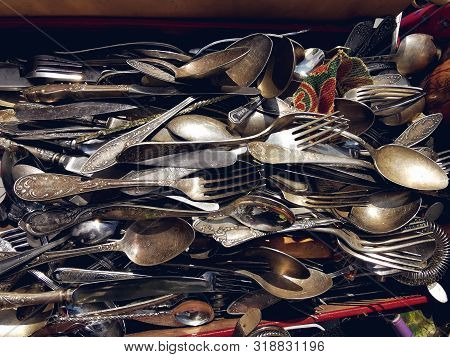Saint-petersburg, Russia - 22 August 2019: Old Vintage Silver And Cupronickel Spoons Sold At The Fle