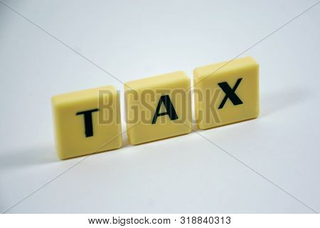 Tax Word Concept Light Background Image Using By Block Letter For Various Purposes Of Tax Return Or 