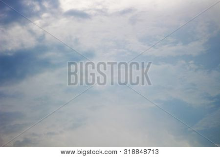 Bright Blue Cloudy Sky With White Cloud